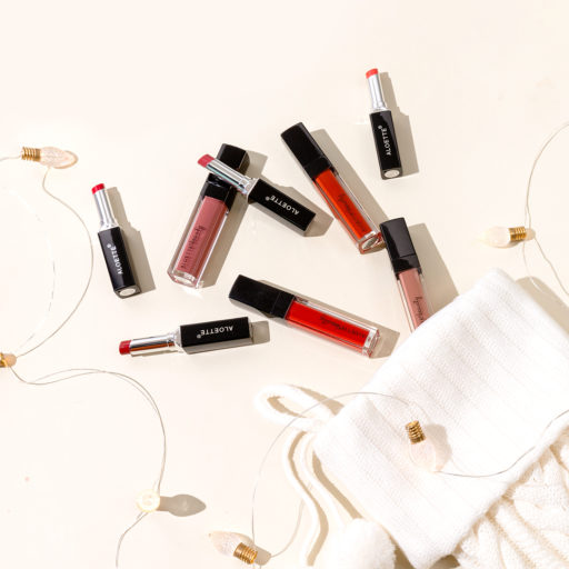 1669582233wpdm_Aloe Kiss and Pout All shades - Caps on and off - flatlay-holiday stocking-cream-1080.jpg